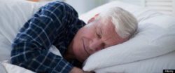 Senior man sleeping in bed. Image shot 2009. Exact date unknown.