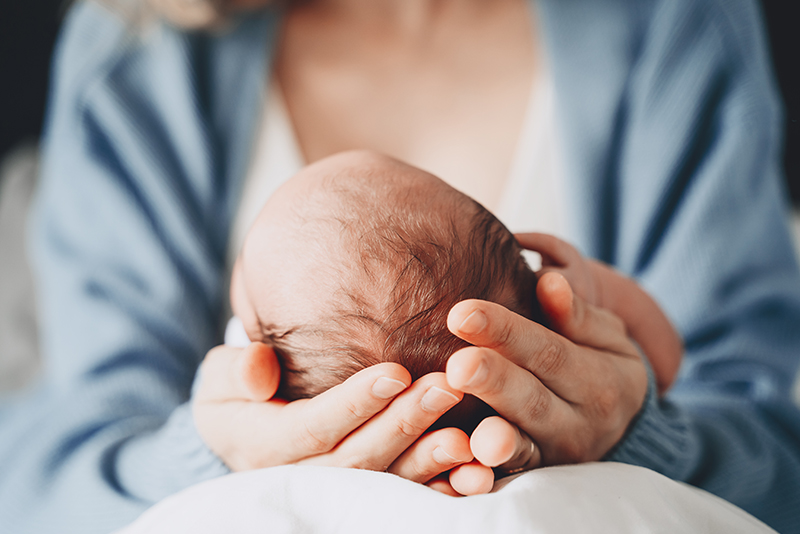 Mother holding a newborn